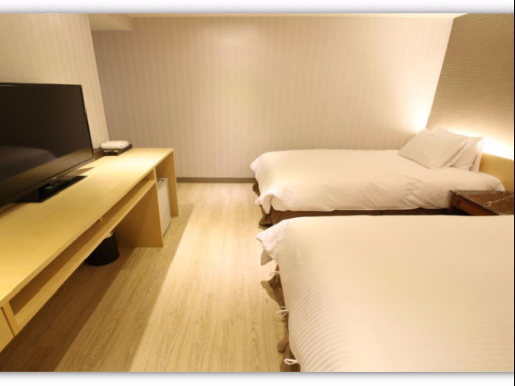 โรงแรมซิมพลี ไลฟ์ เกาสง ภายนอก รูปภาพ